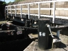 Gate opening and closing gear