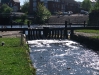 Water pouring over lock gates